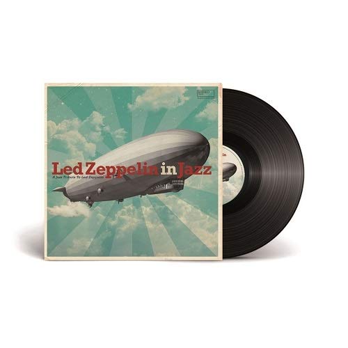 Vinyl record with cover art depicting a zeppelin in a cloudy sky.
