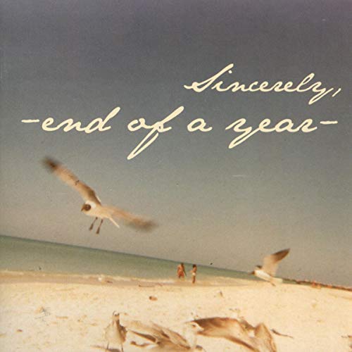 CD cover with beach scene, birds in flight, and cursive text.