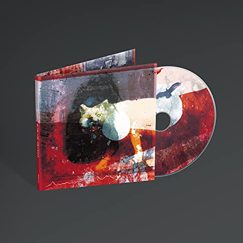 Mogwai album "As The Love Continues" CD with abstract red and white cover art.