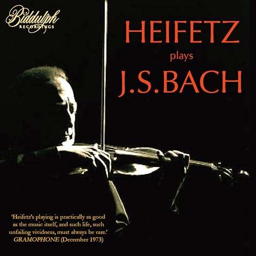 Jascha Heifetz playing the violin in a dark, high-contrast portrait on a CD cover.