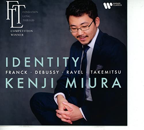 CD cover featuring pianist Kenji Miura in a suit, with text “Identity”.