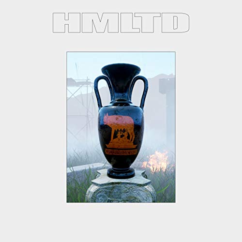 Dark blue vase with a wolf image, set in a misty landscape.