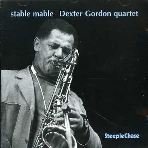 Dexter Gordon playing saxophone, album cover for “Stable Mabel” CD.