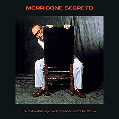 Ennio Morricone album cover: composer peeking from behind a black panel.