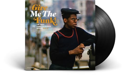 Vinyl record and album cover featuring a man in a cap and sweater.