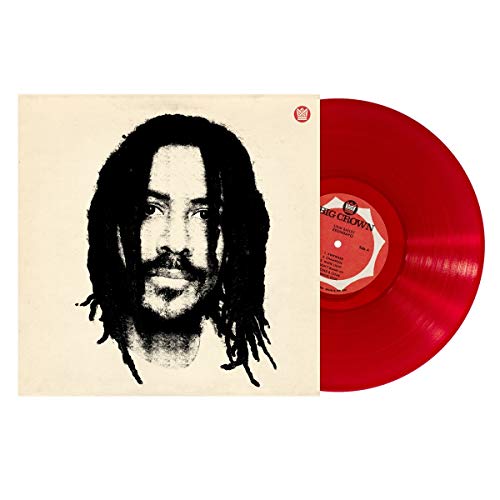 Red vinyl record with portrait of a man with dreadlocks.