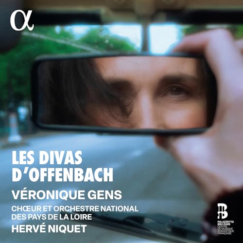 CD cover: woman’s face reflected in a car’s rearview mirror.