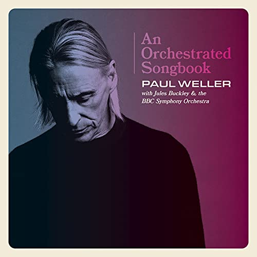 Paul Weller portrait on album cover with purple and blue gradient.