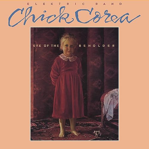 Album cover showing a young girl in a red dress standing in a room.