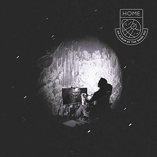 CD cover for Koj’s “Home” album, showing a figure and moonlit landscape.