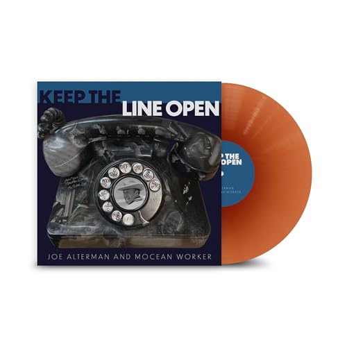 Vinyl record with orange disc and cover featuring a vintage telephone.