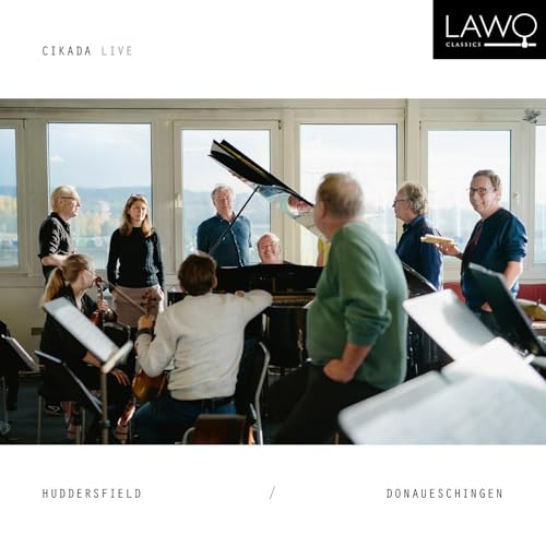 CD cover: musicians performing indoors with a view of trees and sky.
