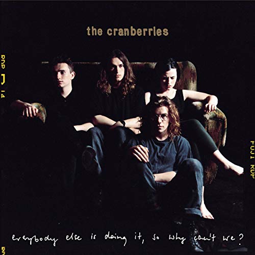 The Cranberries band portrait on album cover, dark and moody aesthetic.
