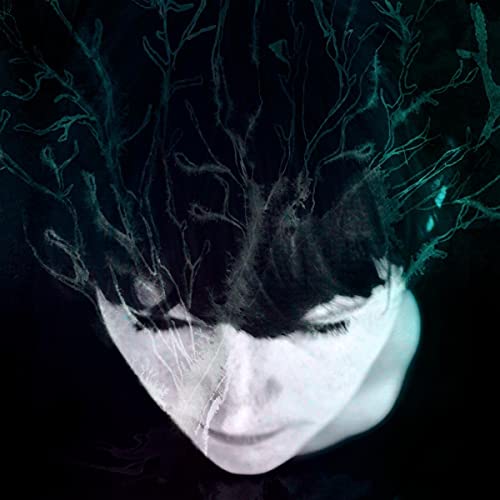 Dark album cover featuring a face with branching, vein-like structures.