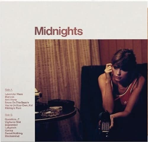 Taylor Swift “Midnights (Blood Moon)” vinyl album cover with a portrait.