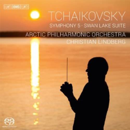 CD cover: Silhouette of a conductor against a sunset seascape.