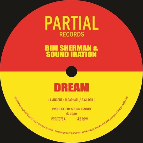 Yellow vinyl record label with red sections, text “Dream” by Bim Sherman.