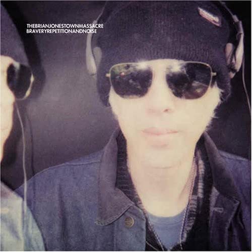 Album cover for Brian Jonestown Massacre, featuring a man in a beanie and sunglasses.