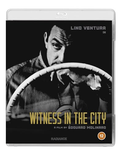 Blu-ray cover for "Witness in the City" featuring a man at a steering wheel.