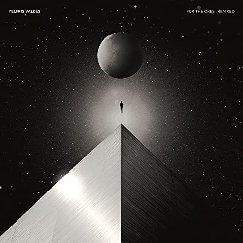 Album cover: black space scene with a pyramid and small figure.