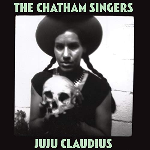 Black and white album cover featuring a woman with a skull.