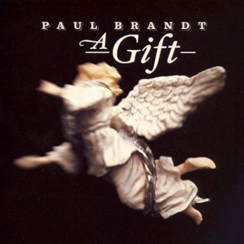 CD cover for Paul Brandt’s “A Gift” featuring an angel figurine.