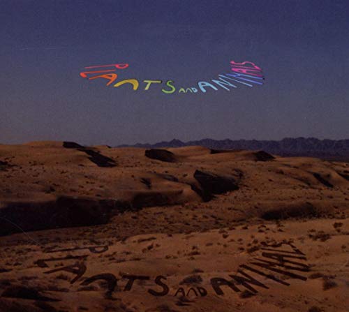 CD cover with desert landscape and colorful, stylized band name.