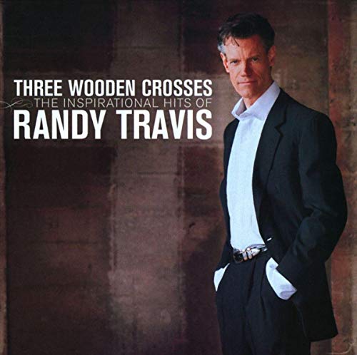 Randy Travis album cover, featuring the artist in a dark suit.