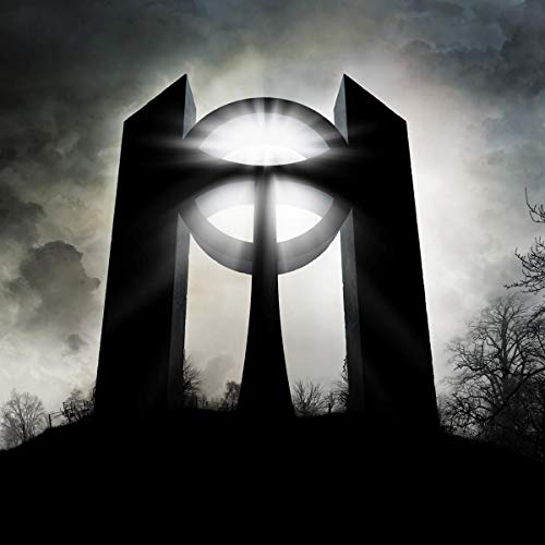 Dark album cover featuring a monolith with a bright central light.