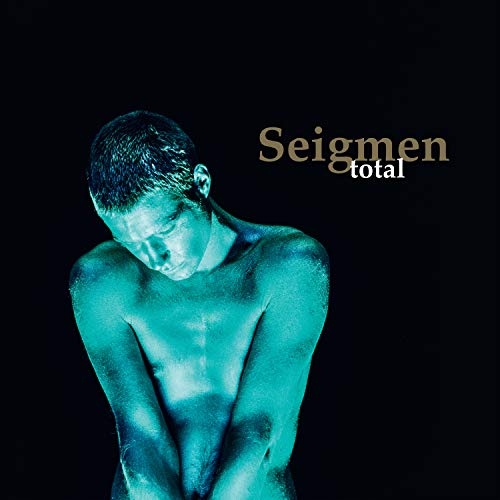 Album cover for Seigmen’s “Total” featuring a man in teal lighting.