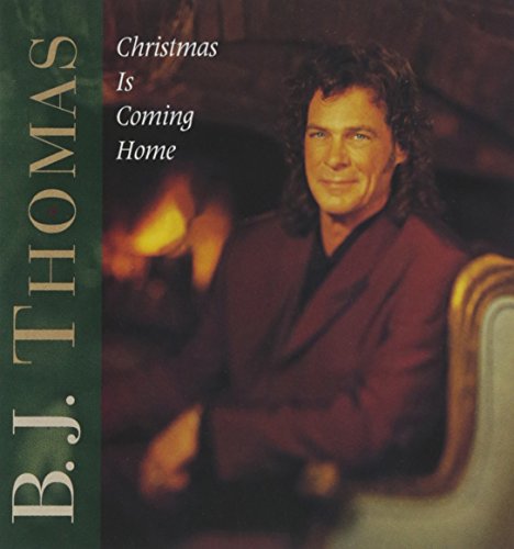 B.J. Thomas album cover, "Christmas Is Coming Home", portrait and fireplace.