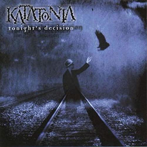 Album cover: man with raised arm, bird flying, railway tracks.