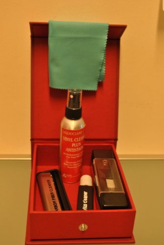 Red box containing vinyl cleaning kit with spray, cloth, and brush.