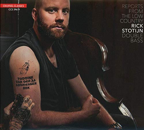 Rick Stotijn, double bass player, portrait with instrument and tattoos.