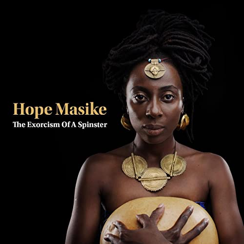 Hope Masike album cover featuring a woman with dreadlocks and golden jewelry.