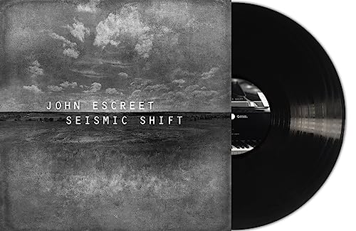 John Escreet's "Seismic Shift" vinyl record with cloudy album art.