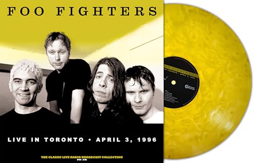Foo Fighters album cover and yellow vinyl record, 1996 Toronto concert.