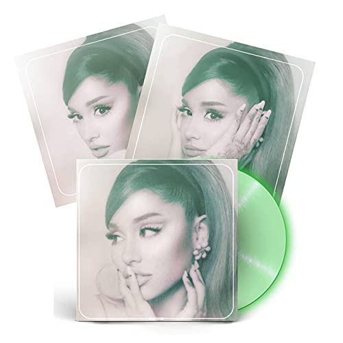 Ariana Grande album "Positions" vinyl record with green disc visible.