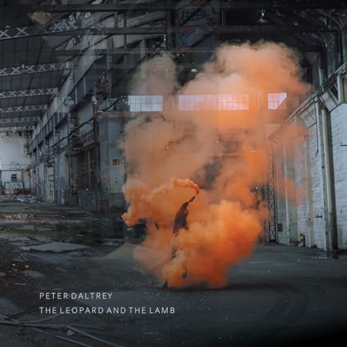 Album cover: orange smoke fills an industrial space, text at bottom.