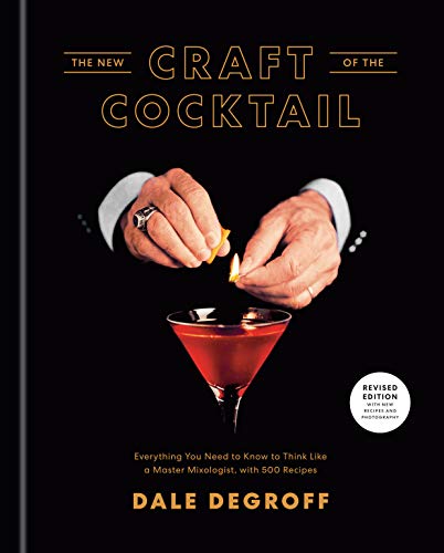 Book cover: "The New Craft of the Cocktail" with hands lighting an orange peel.