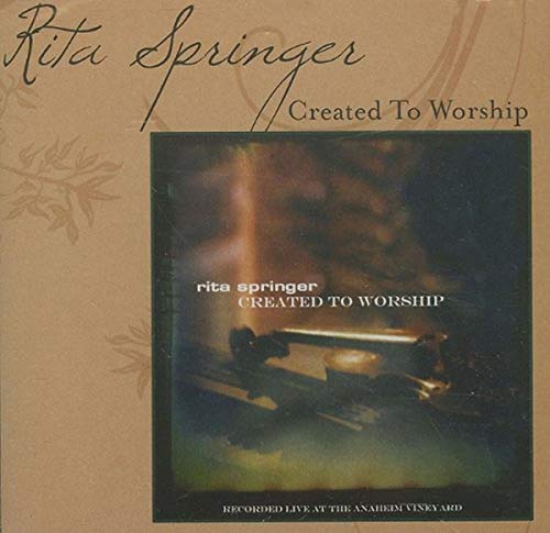 CD cover for Rita Springer’s “Created to Worship,” featuring a piano.