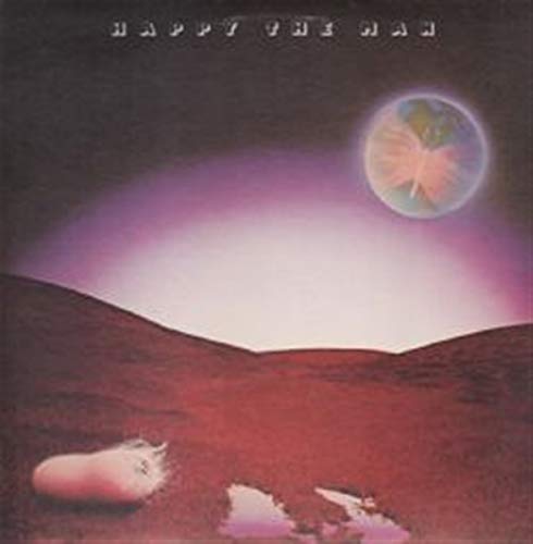 CD cover: dark landscape with glowing orb and reclining figure.