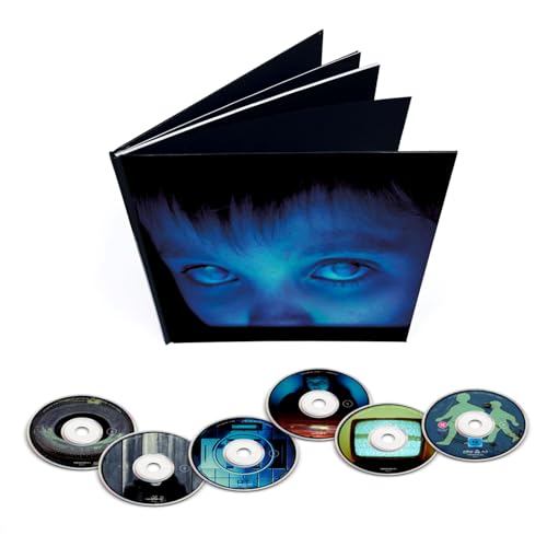 Deluxe CD box set with a book and multiple discs, blue eyes featured.