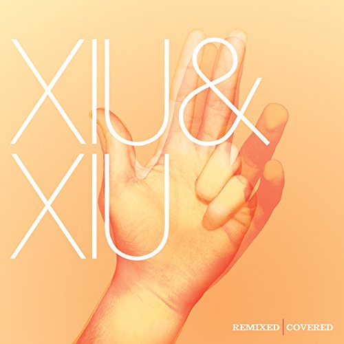 CD cover for Xiu Xiu - Remixed & Covered, with hand imagery.