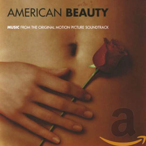 American Beauty" soundtrack CD cover with a hand holding a red rose.