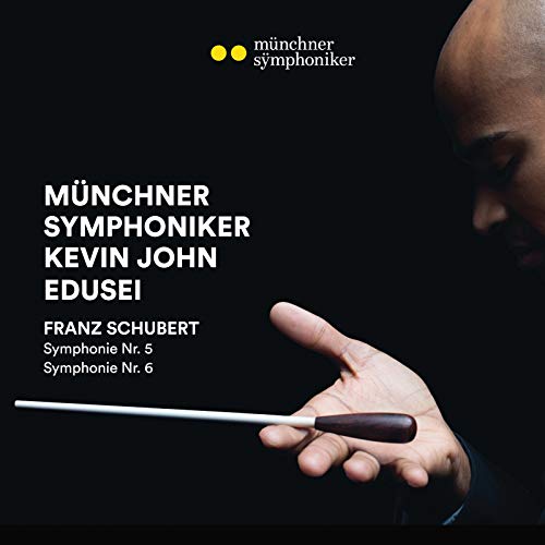 CD cover featuring a conductor’s hand holding a baton, black background.