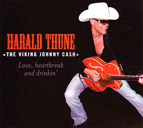 Harald Thune in a white cowboy hat playing a red electric guitar.