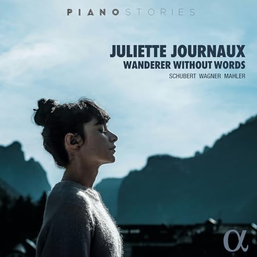 CD cover featuring a woman with headphones, mountains, and text.