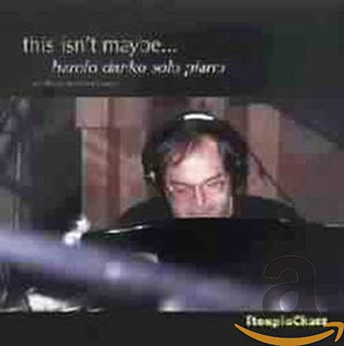 CD cover featuring pianist Harold Danko in a dimly lit studio.