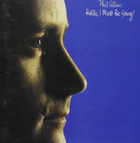 Close-up profile of Phil Collins against a blue background with album title text.